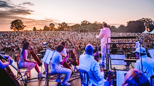 An orchestra performing at the Classic Ibiza event at Blickling Estate, Norfolk